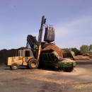 Processing Natural Mulch Into Black Dyed Mulch