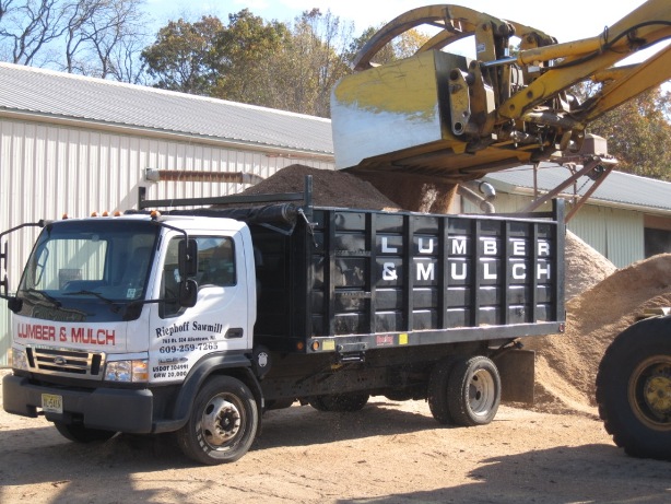 Loading Sawdust For Delivery