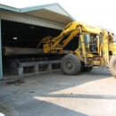 Loading a 30 ft log on the log deck