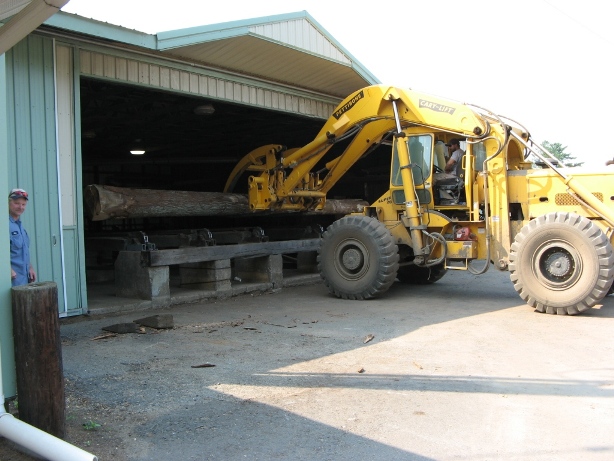 Loading a 30 ft log on the log deck